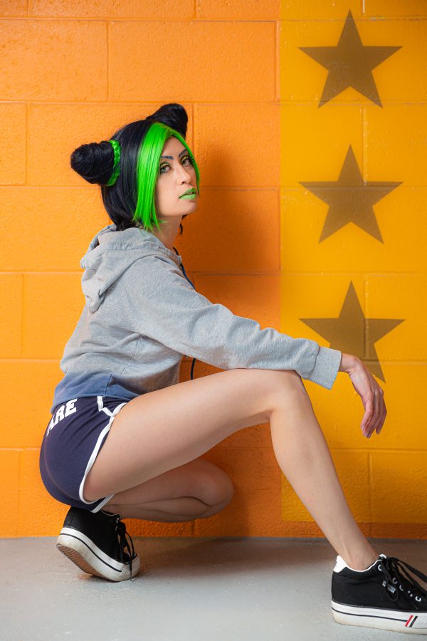 Ugami as Jolyne Cujoh from Jojo's Bizarre Adventure modeling the YARE YARE Booty Shorts